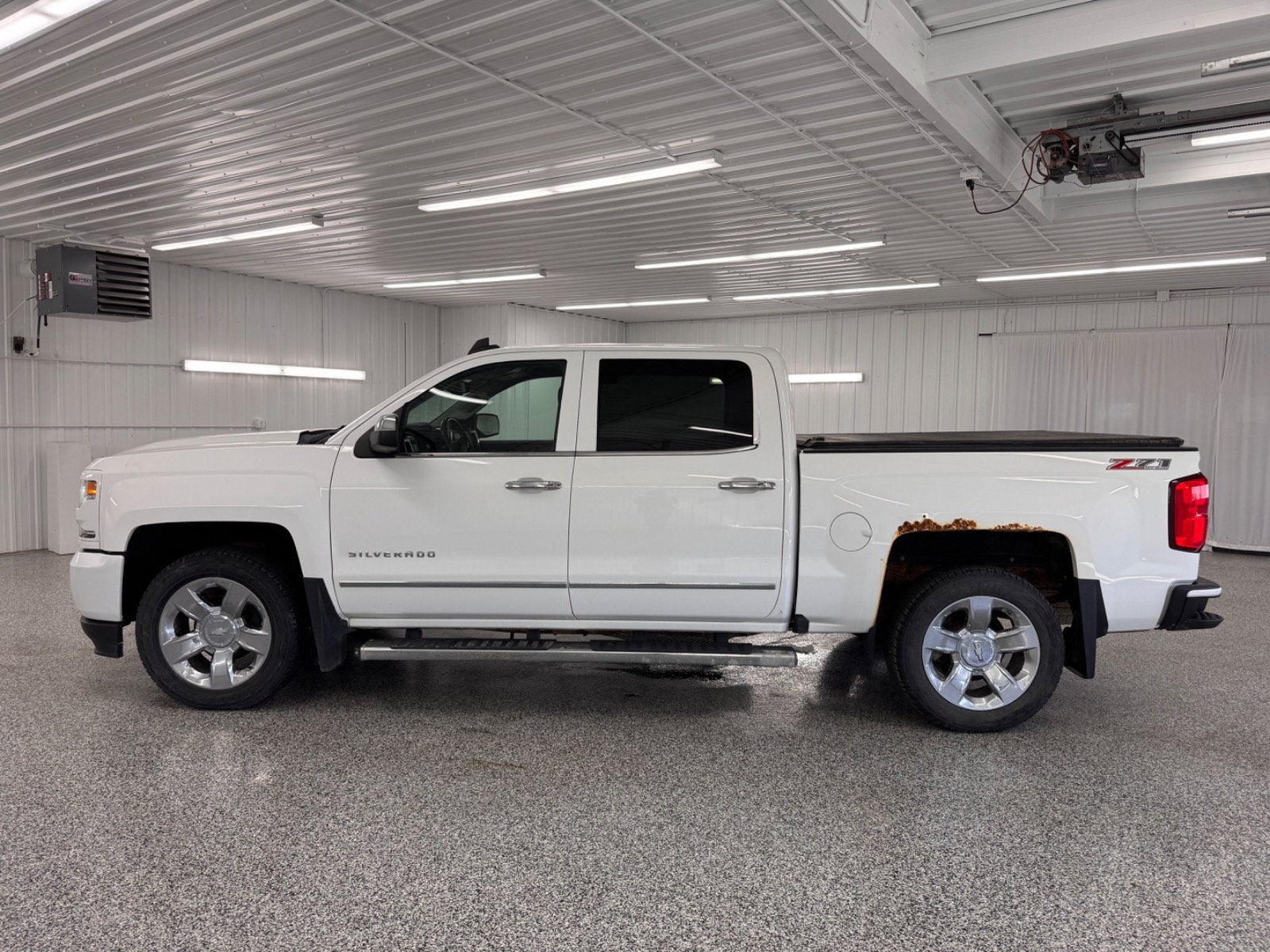 Used 2016 Chevrolet Silverado 1500 LTZ with VIN 3GCUKSEC8GG214699 for sale in New Hampton, IA